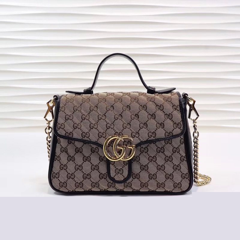 G*u*i top handle bags